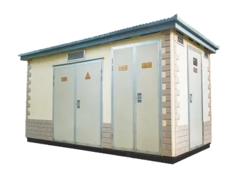 A professional studio shot of a three-phase dry-type cast resin transformer with prominent red cylindrical coils, cross-connected wiring, and cooling fans at the base, set against a plain white background.